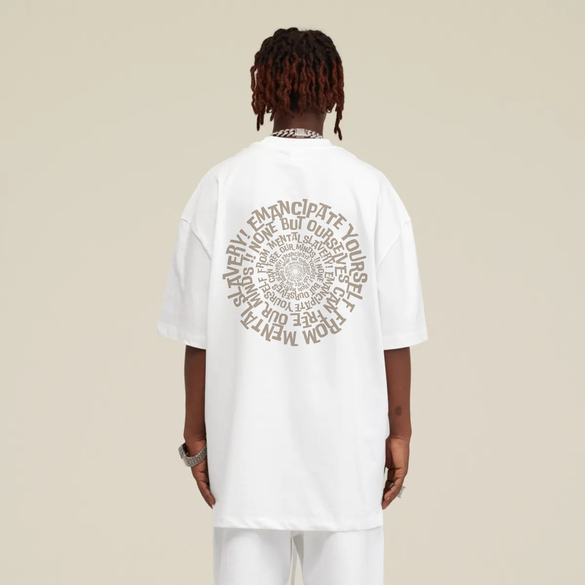 A person from behind wearing the Blackness Emancipation Tee with the sentence Emancipate yourself from mental slavery! - WEAREBLACKNESS.COM