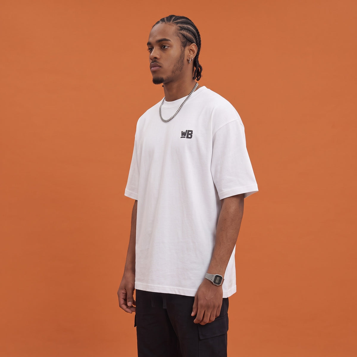 Blackness Mawon Tee White — side view of the drop-shoulder sleeve and boxy oversized fit, oversized heavyweight cotton streetwear tee by We Are Blackness