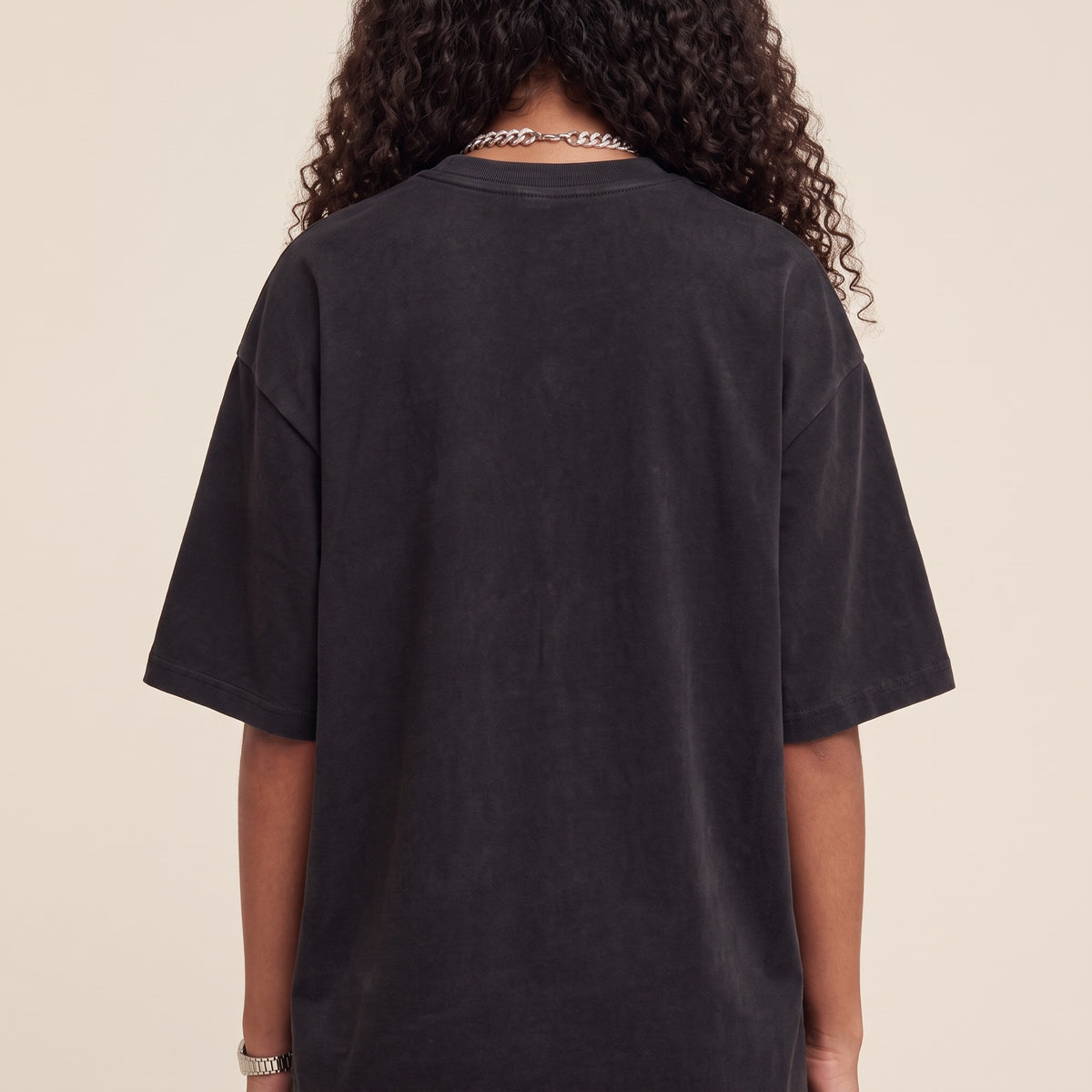Wear Blackness Tee Black — upper back detail, clean plain back and drop-shoulder seams, oversized heavyweight cotton streetwear tee by We Are Blackness